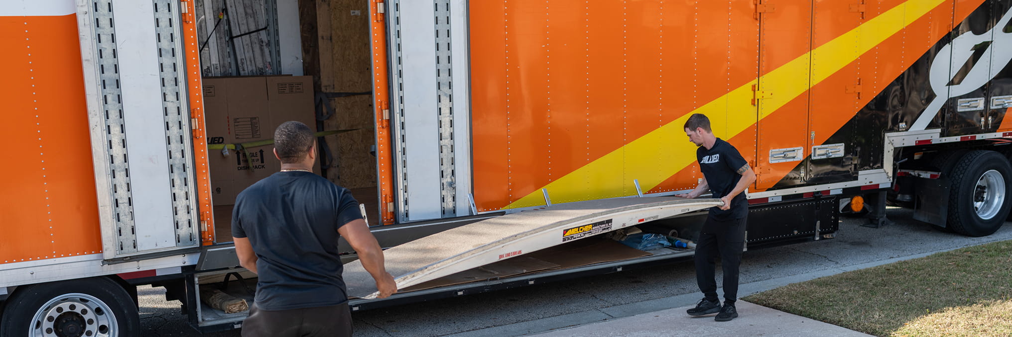 Reliable-Lyndhurst-OH-Movers-for-Homes-and-Businesses-banner-1 allied and morse moving & storage team loads items into a truck